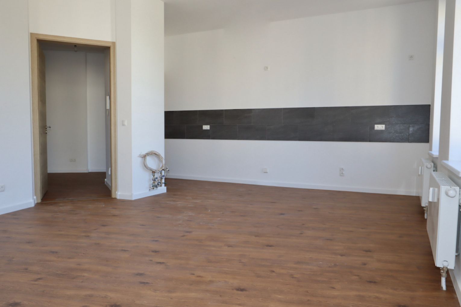 4 Zimmer • offene Küche • große Portaltüren • vollausgestattes Tageslichtbad • moderne Böden • TOP!