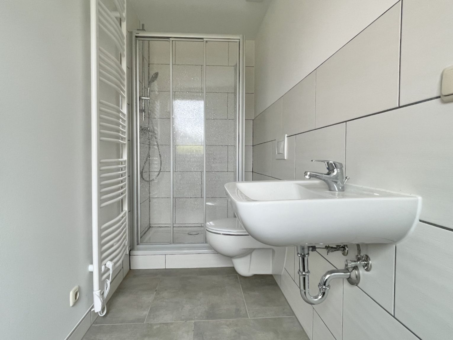 2-Zimmer • Laminat • Tageslichtbad mit Dusche • große Wohnküche • Stellplatz • jetzt anschauen