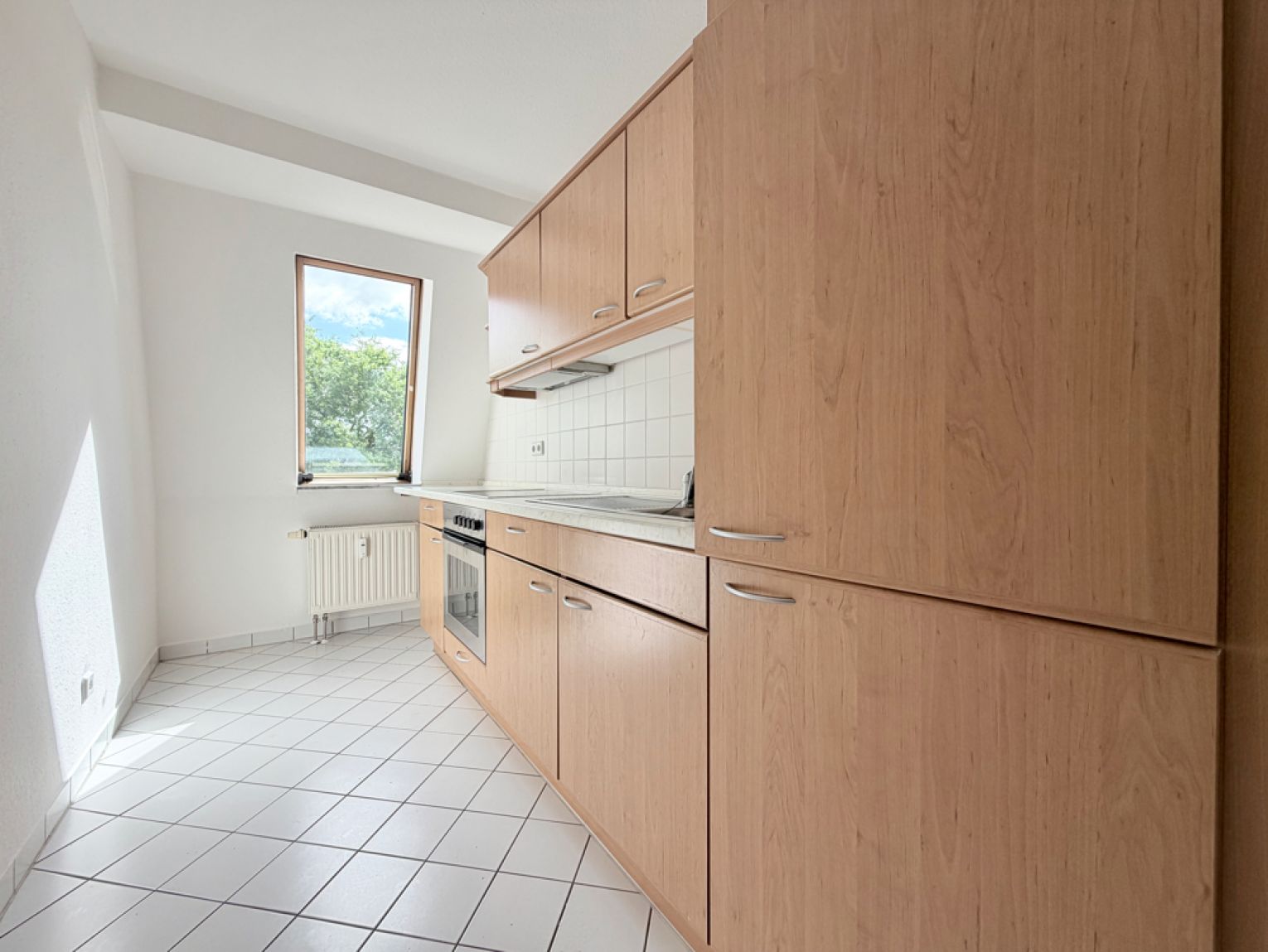 1 Zimmer • im Dachgeschoss • mit Dachterrasse • Tiefgaragenstellplatz • zur Miete • ab sofort frei!